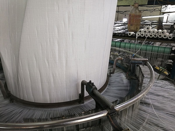 Output of circular weaving machine