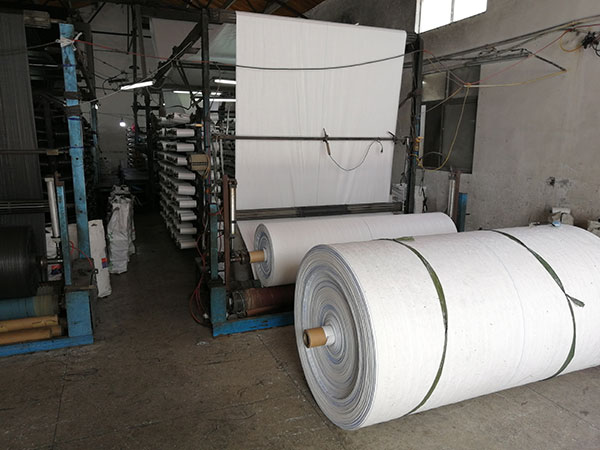 Plastic bag circular weaving machine